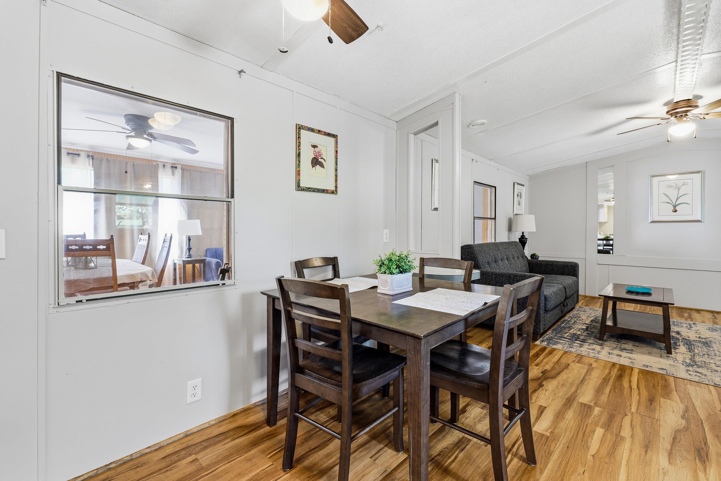 702 Richview Road Rileyville, VA 22650 - Photo 11 of 75 a view of a dining room with furniture and wooden floor