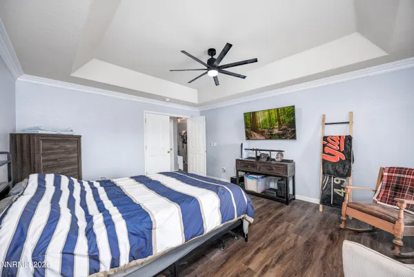 a bathroom with a tub a sink and a window