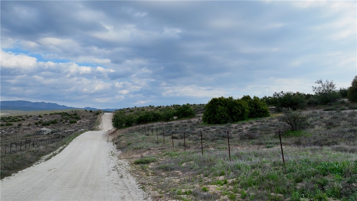 4 Indian Road Anza, CA 92539 - Photo 17 of 17 a view of a dry yard with wooden fence