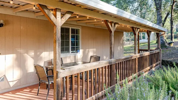 a kitchen with stainless steel appliances kitchen island granite countertop a sink and cabinets