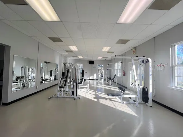 a view of a room with gym equipment