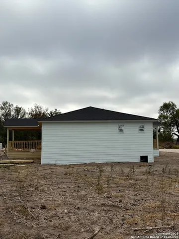 a view of a swimming pool with a porch