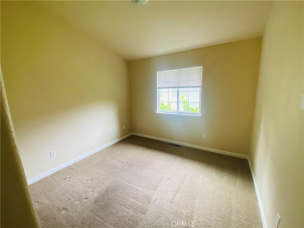 16506 Ridgecrest Court Hidden Valley Lake, CA 95467 - Photo 18 of 25 a view of an empty room with a window