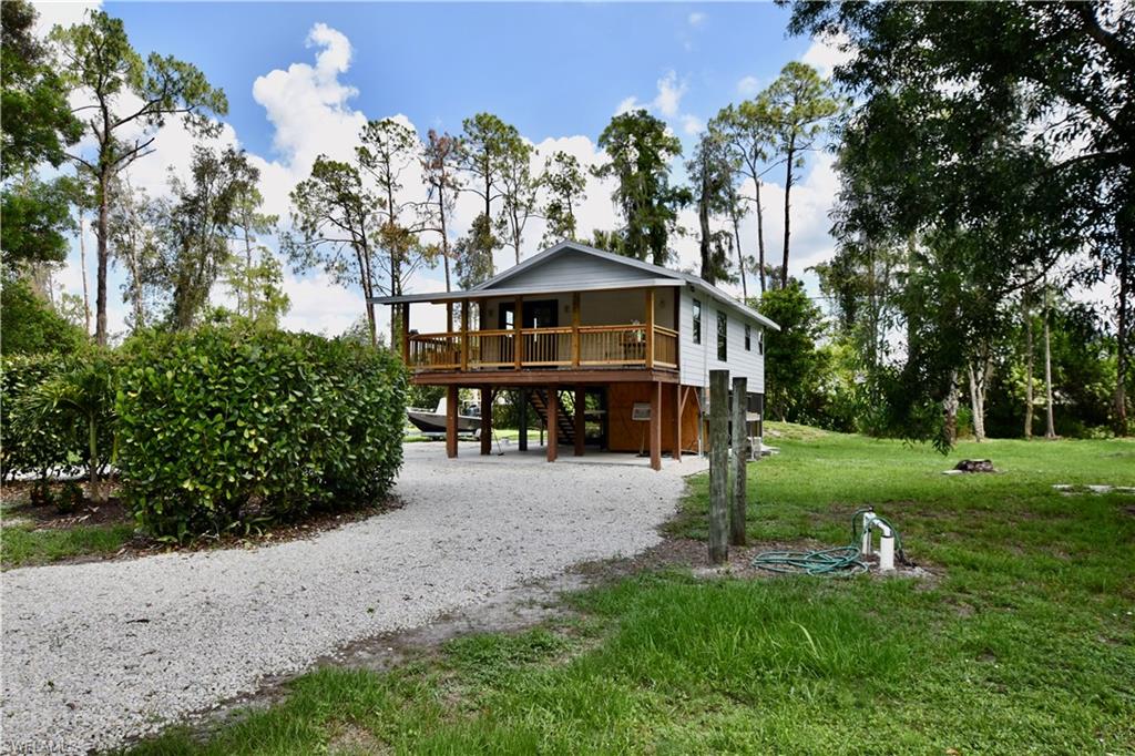 1725 Acremaker Road Naples, FL 34120 - Photo 1 of 15