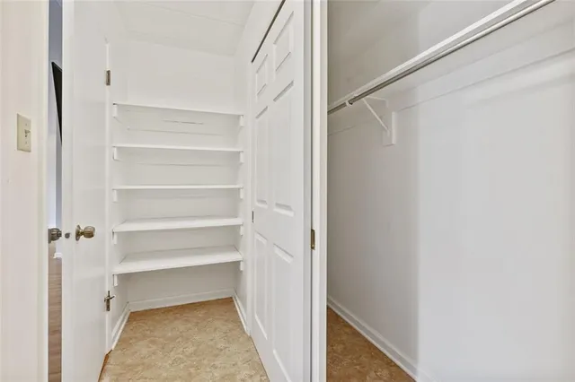 a view of a walk in closet