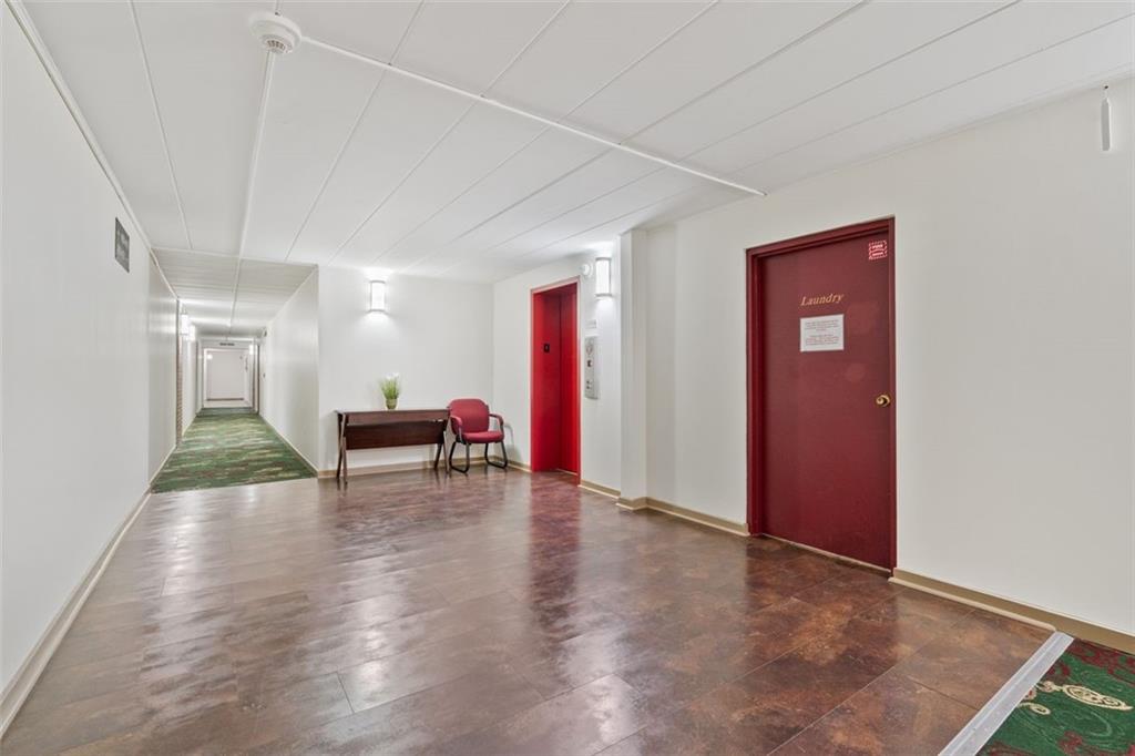 5 Bayard Road, Unit 416 Shadyside, PA 15213 - Photo 18 of 20 a view of empty room with wooden floor