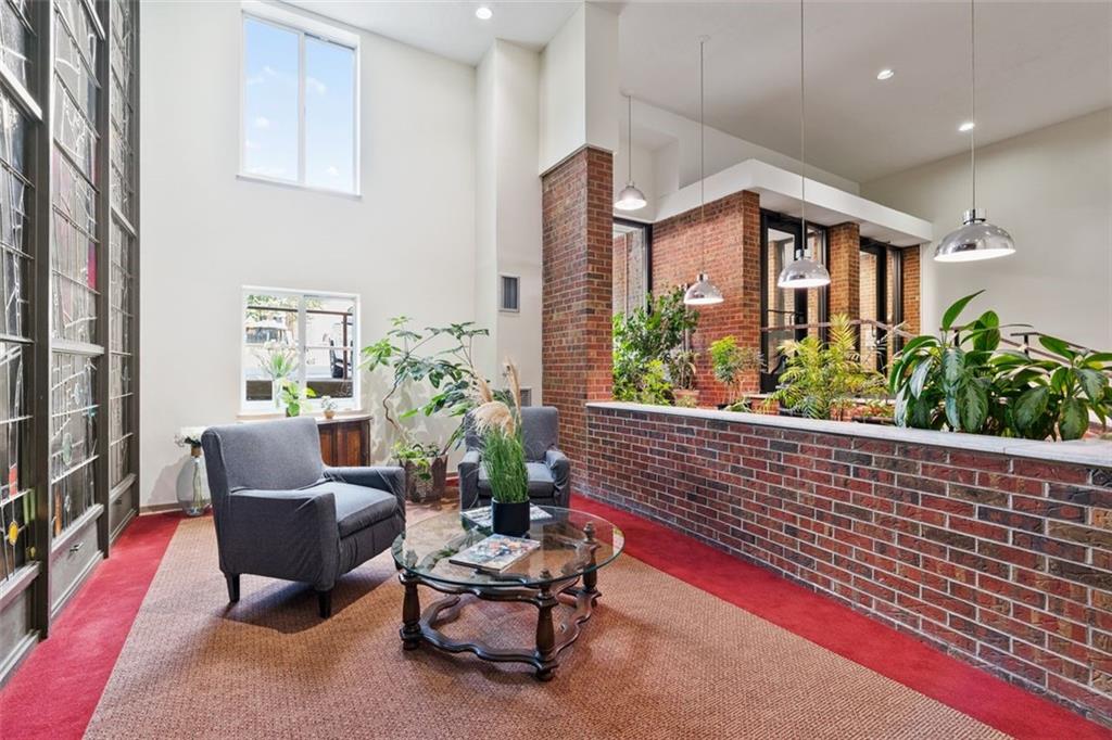 5 Bayard Road, Unit 416 Shadyside, PA 15213 - Photo 5 of 20 a outdoor living space with furniture potted plant and a window
