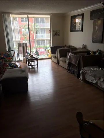 a bedroom with bed and a couch