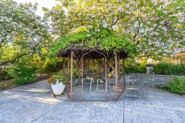 a view of a lake with sunset in background