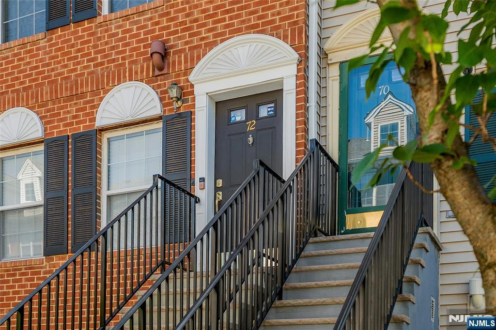 72 Marrow Street, Unit 3101 Newark, NJ 07103 - Photo 2 of 20 a view of a brick house with many windows