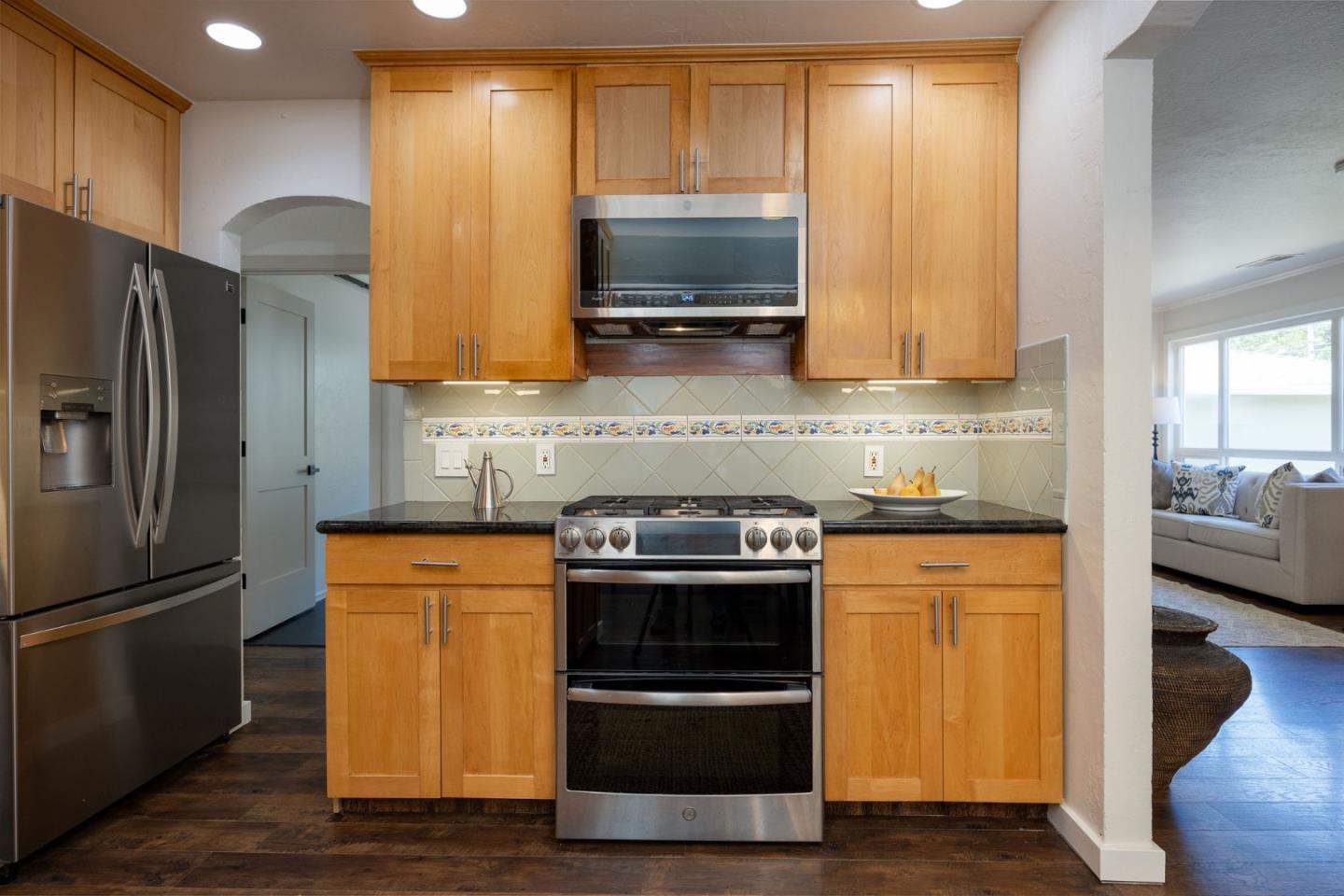 1572 Linda Mar Boulevard Pacifica, CA 94044 - Photo 11 of 25 a kitchen with a sink stove and refrigerator
