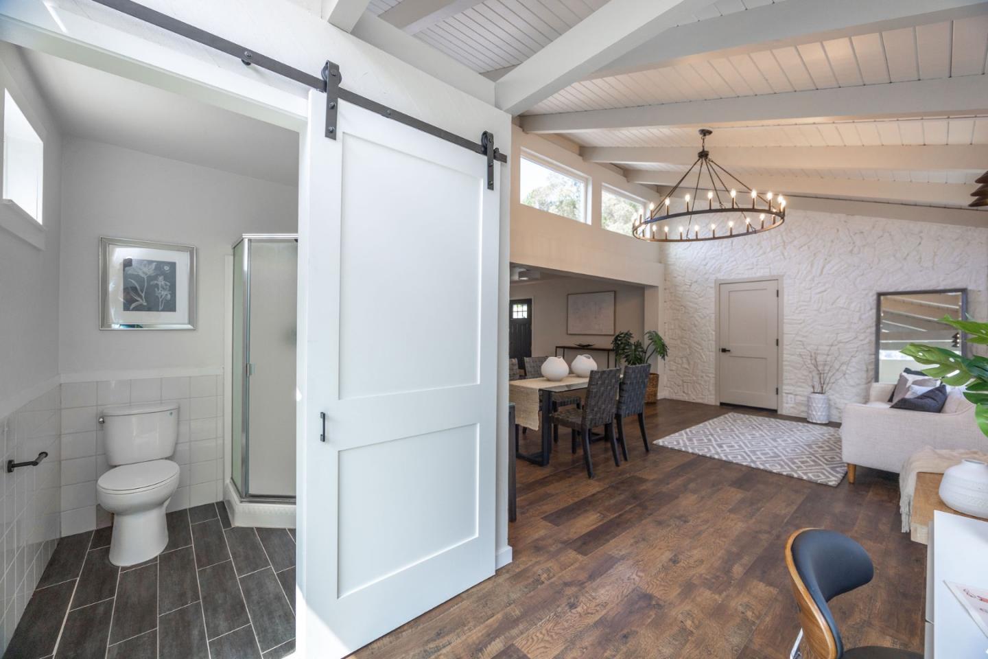 1572 Linda Mar Boulevard Pacifica, CA 94044 - Photo 17 of 25 a view of a living room and dining room