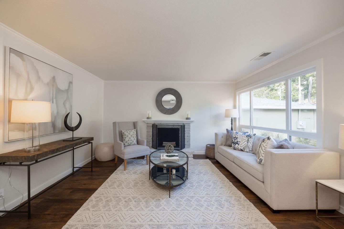 1572 Linda Mar Boulevard Pacifica, CA 94044 - Photo 2 of 25 a living room with furniture and a large window