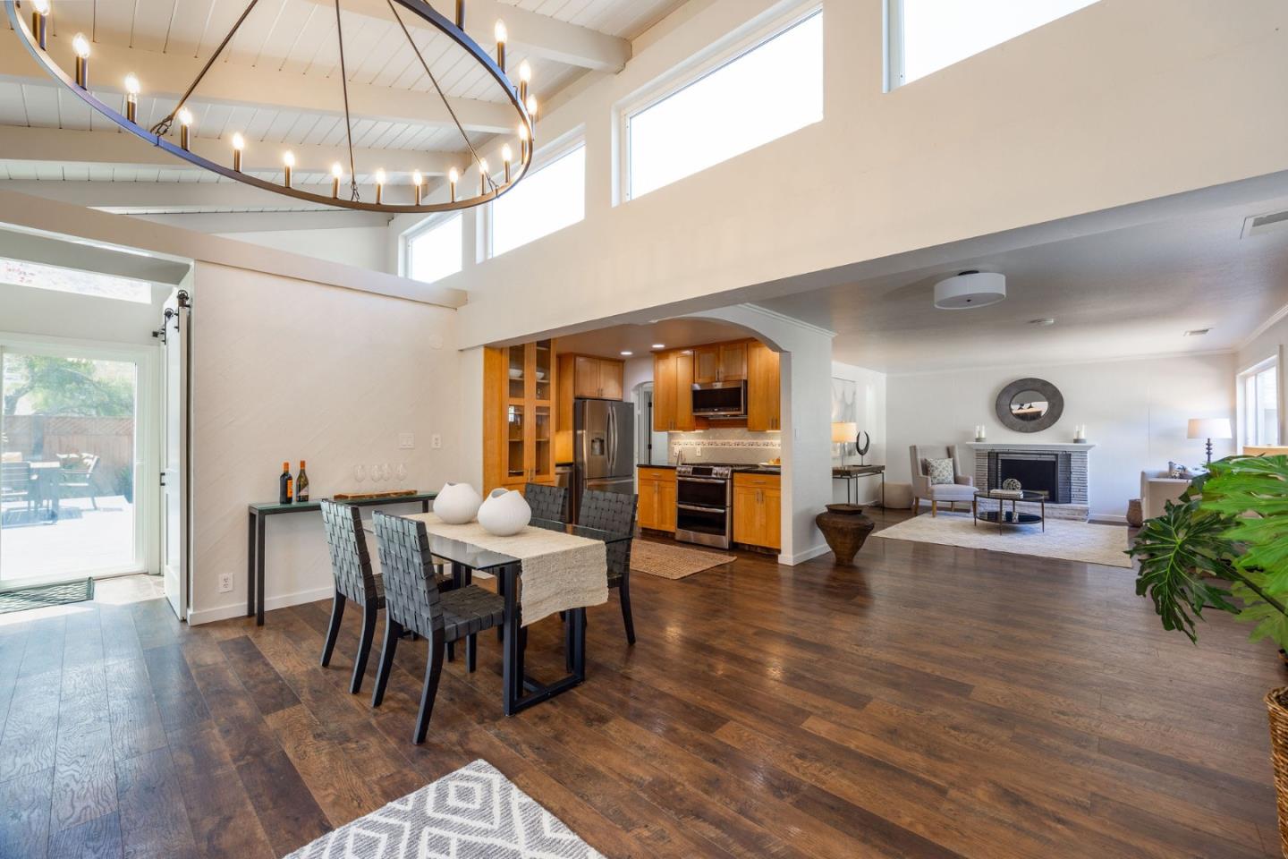 1572 Linda Mar Boulevard Pacifica, CA 94044 - Photo 8 of 25 a view of a dining room with furniture and wooden floor