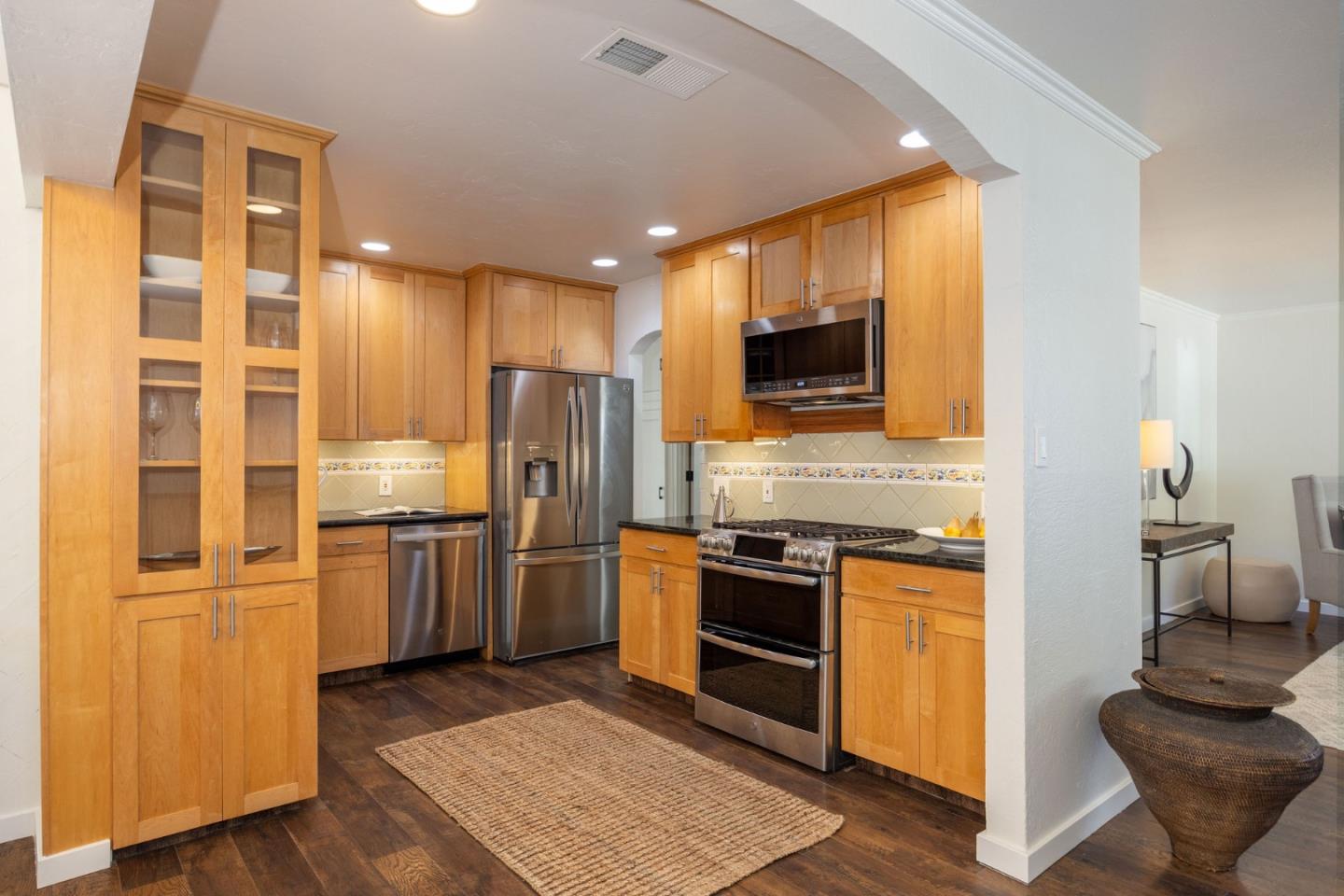 1572 Linda Mar Boulevard Pacifica, CA 94044 - Photo 10 of 25 a kitchen with a refrigerator stove and sink