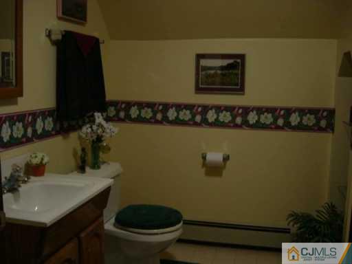 1 John Place Helmetta, NJ 08828 - Photo 5 of 8 a bathroom with a sink and a toilet