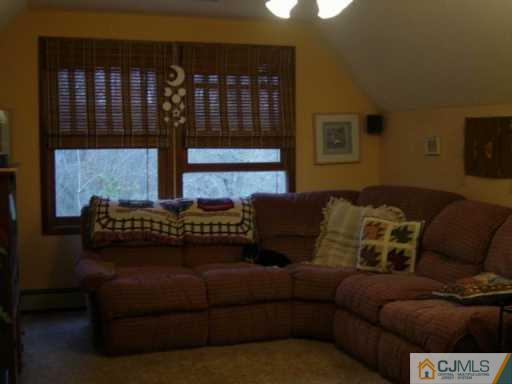 1 John Place Helmetta, NJ 08828 - Photo 6 of 8 a living room with furniture