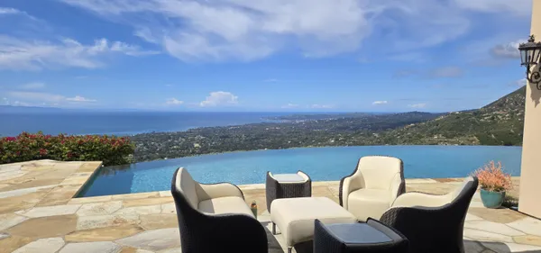 a view of a terrace with couches and a table