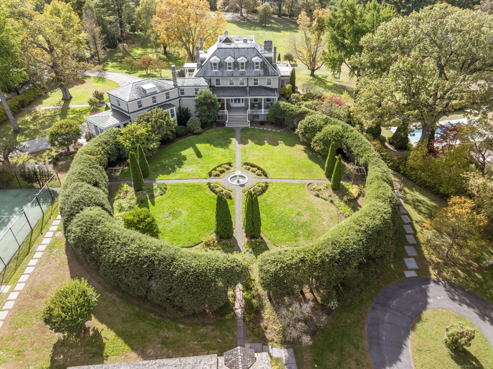 a view of a fountain in front of pathway