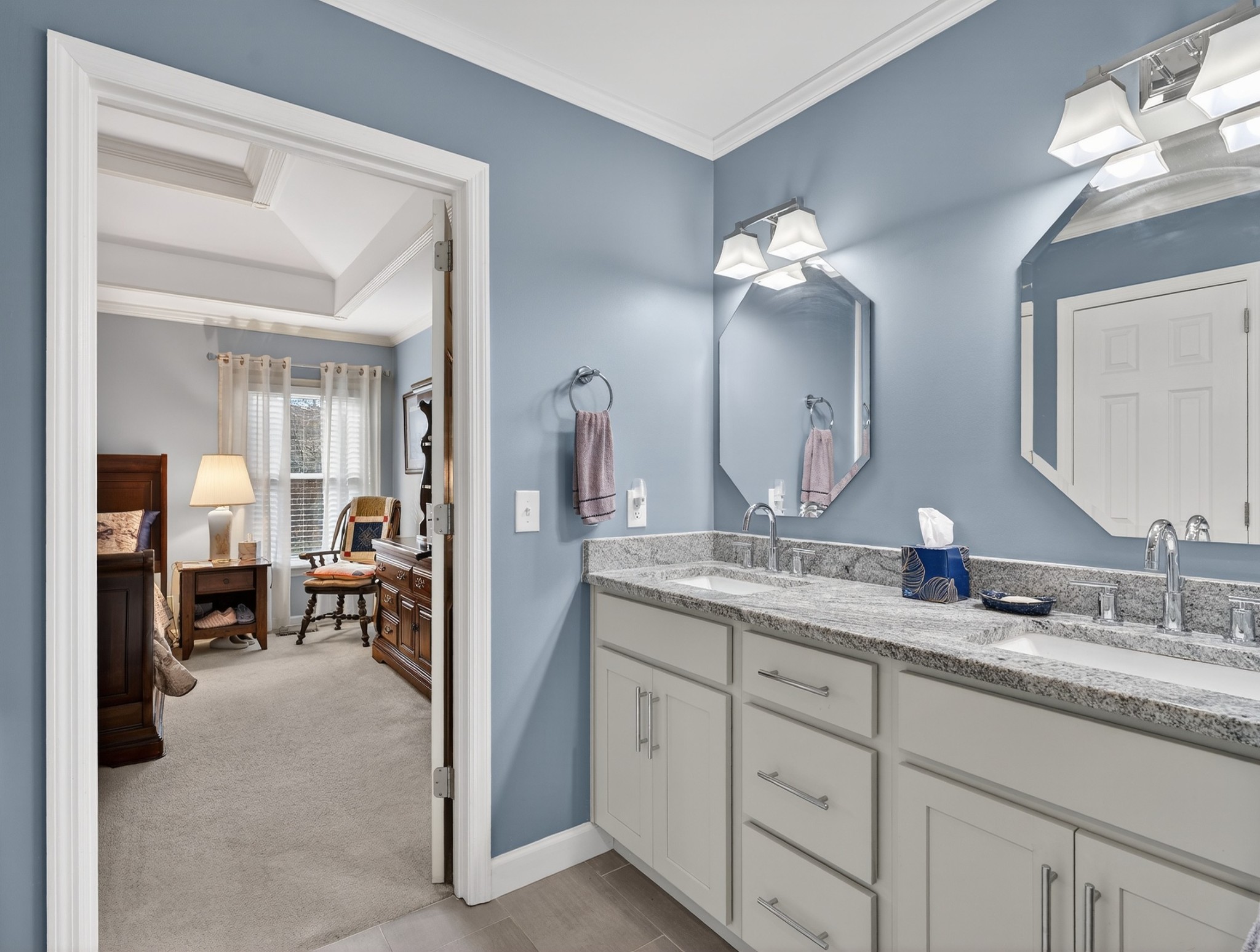 5444 Reagan Run Antioch, TN 37013 - Photo 22 of 46 a en suite bathroom with double sink and a mirror