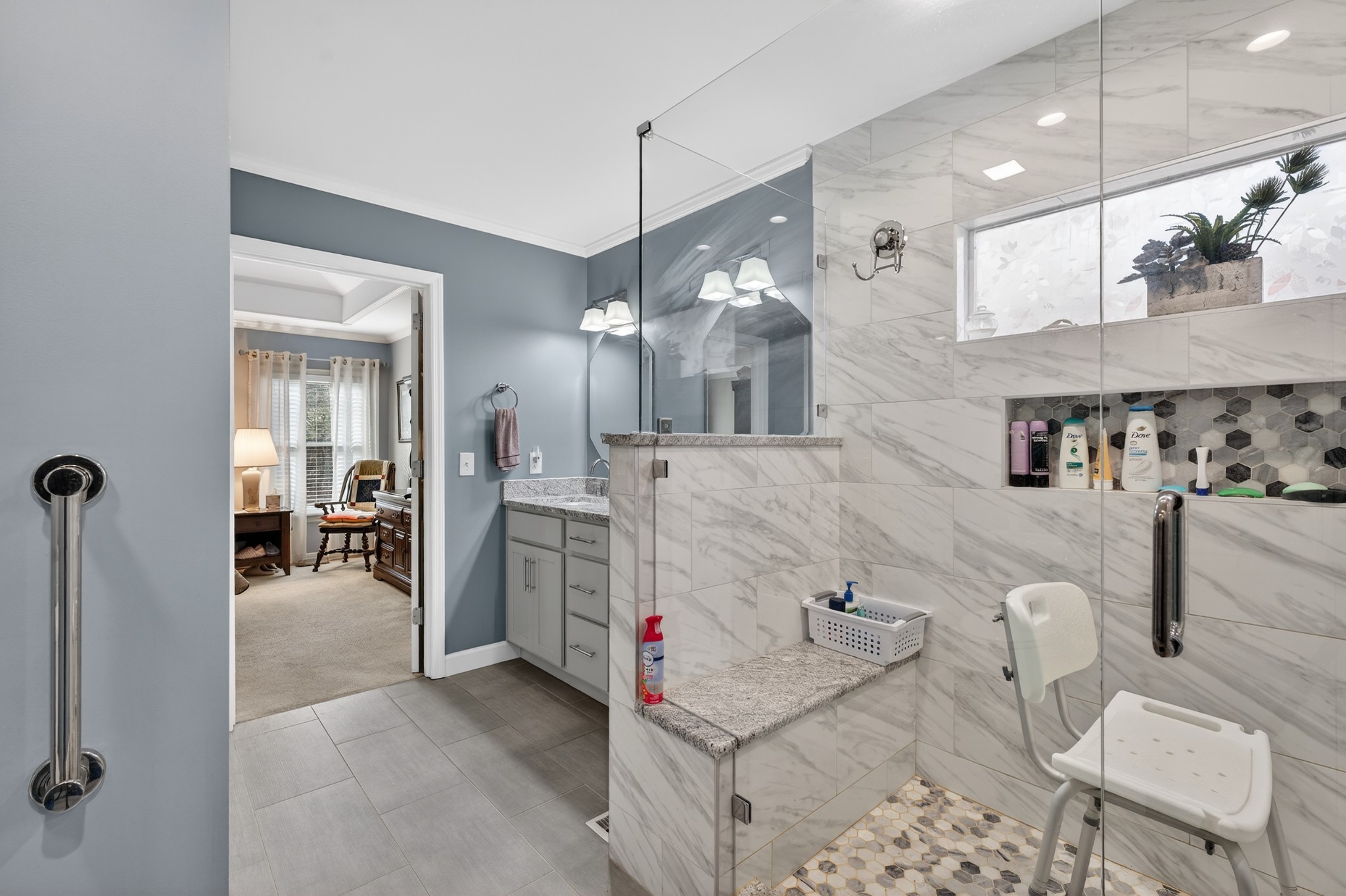 5444 Reagan Run Antioch, TN 37013 - Photo 23 of 46 a bathroom with a sink a vanity and mirror