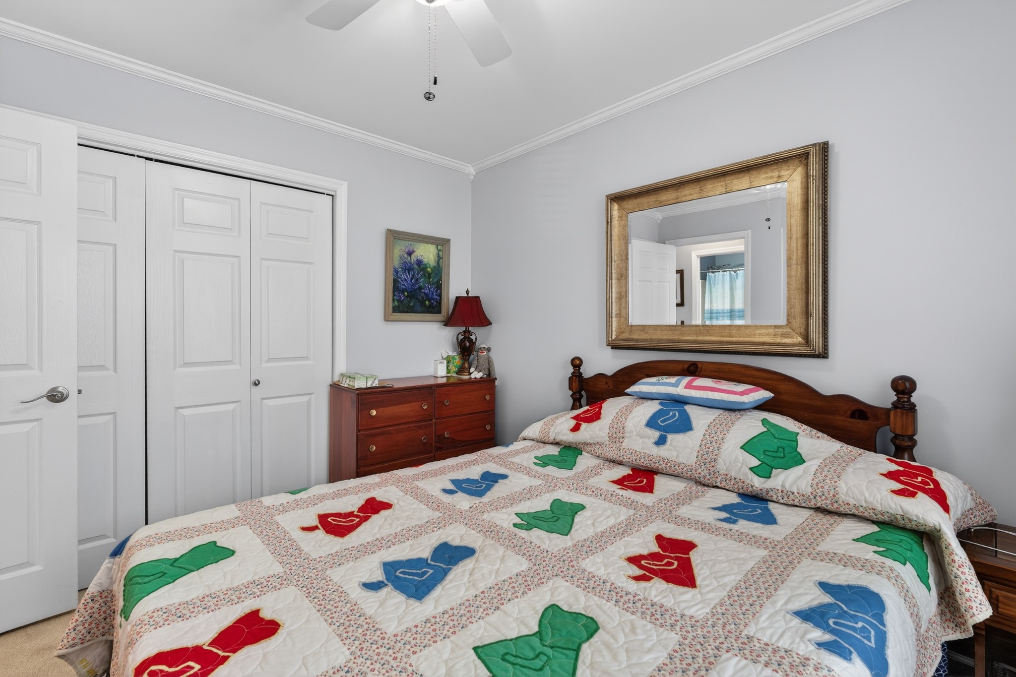 5444 Reagan Run Antioch, TN 37013 - Photo 24 of 46 a bedroom that has a bed and a dresser in it