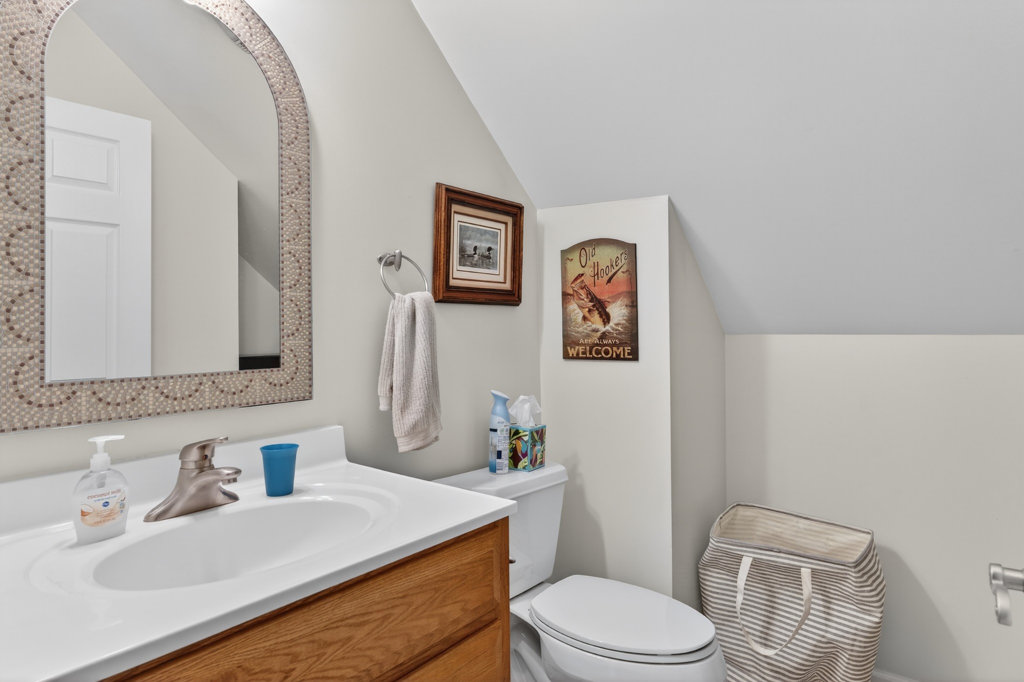 5444 Reagan Run Antioch, TN 37013 - Photo 36 of 46 a bathroom with a sink a toilet and mirror