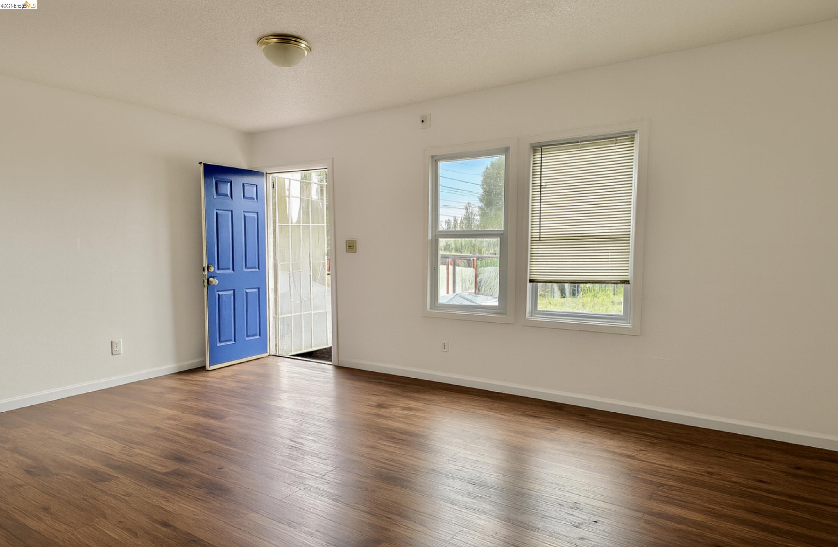 121 Lincoln Road East Vallejo, CA 94590 - Photo 11 of 15 Foyer entrance featuring dark wood-style flooring and a textured ceiling