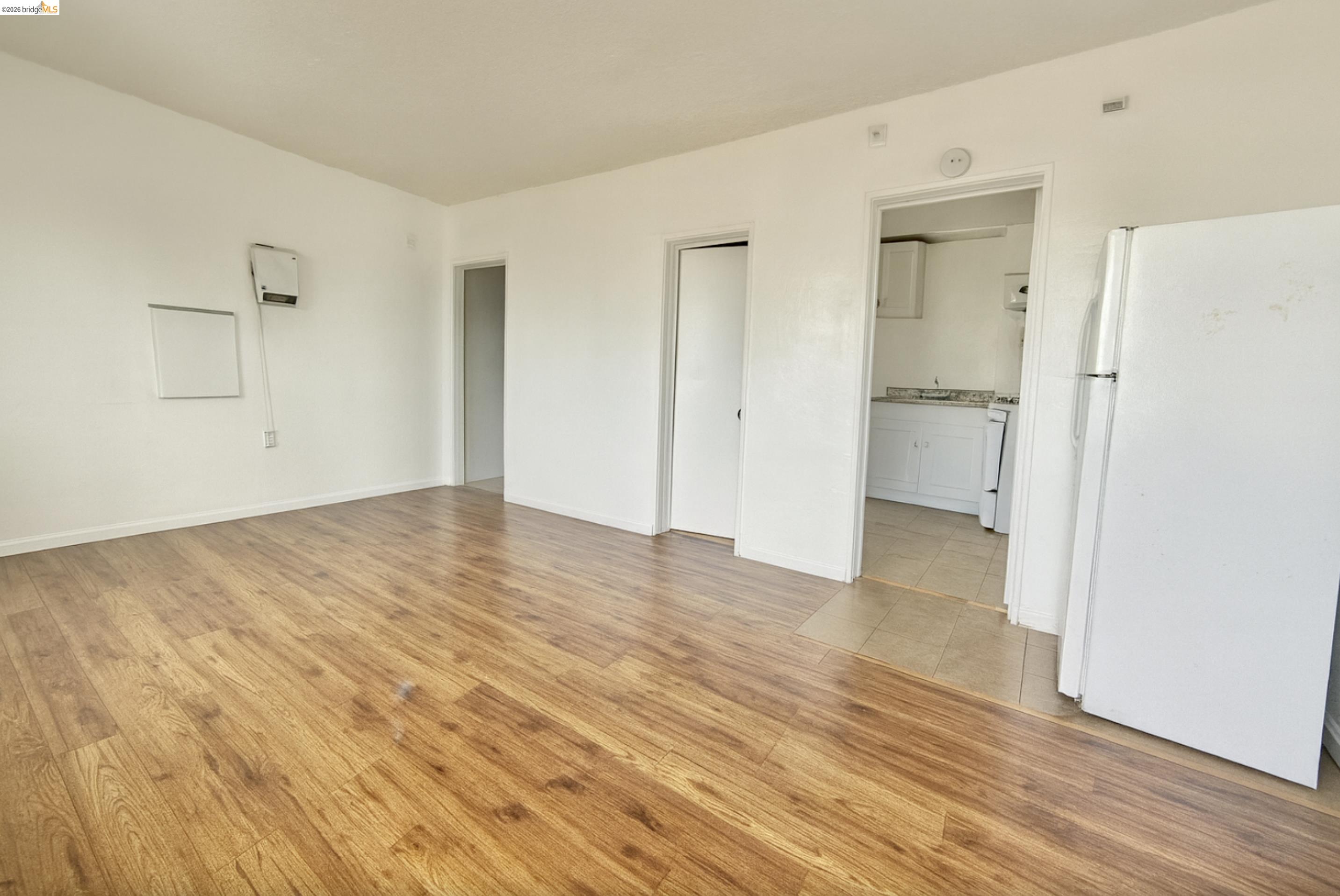 121 Lincoln Road East Vallejo, CA 94590 - Photo 12 of 15 Unfurnished living room with light wood-style flooring