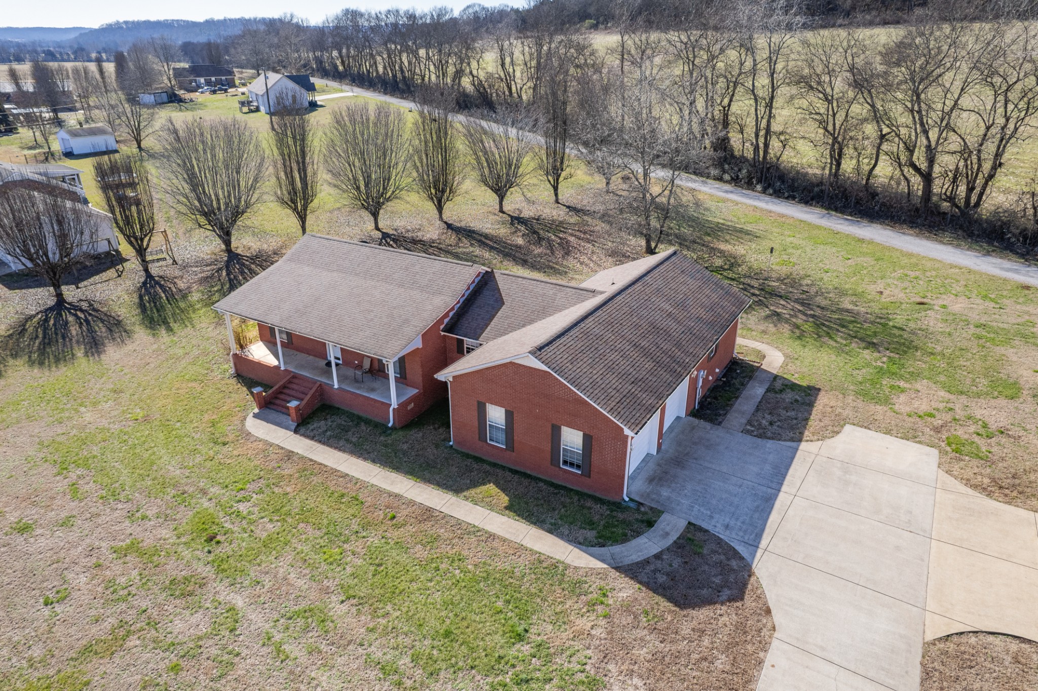 2200 Crescentview Road Pulaski, TN 38478 - Photo 2 of 69 a view of a house with pool and a yard