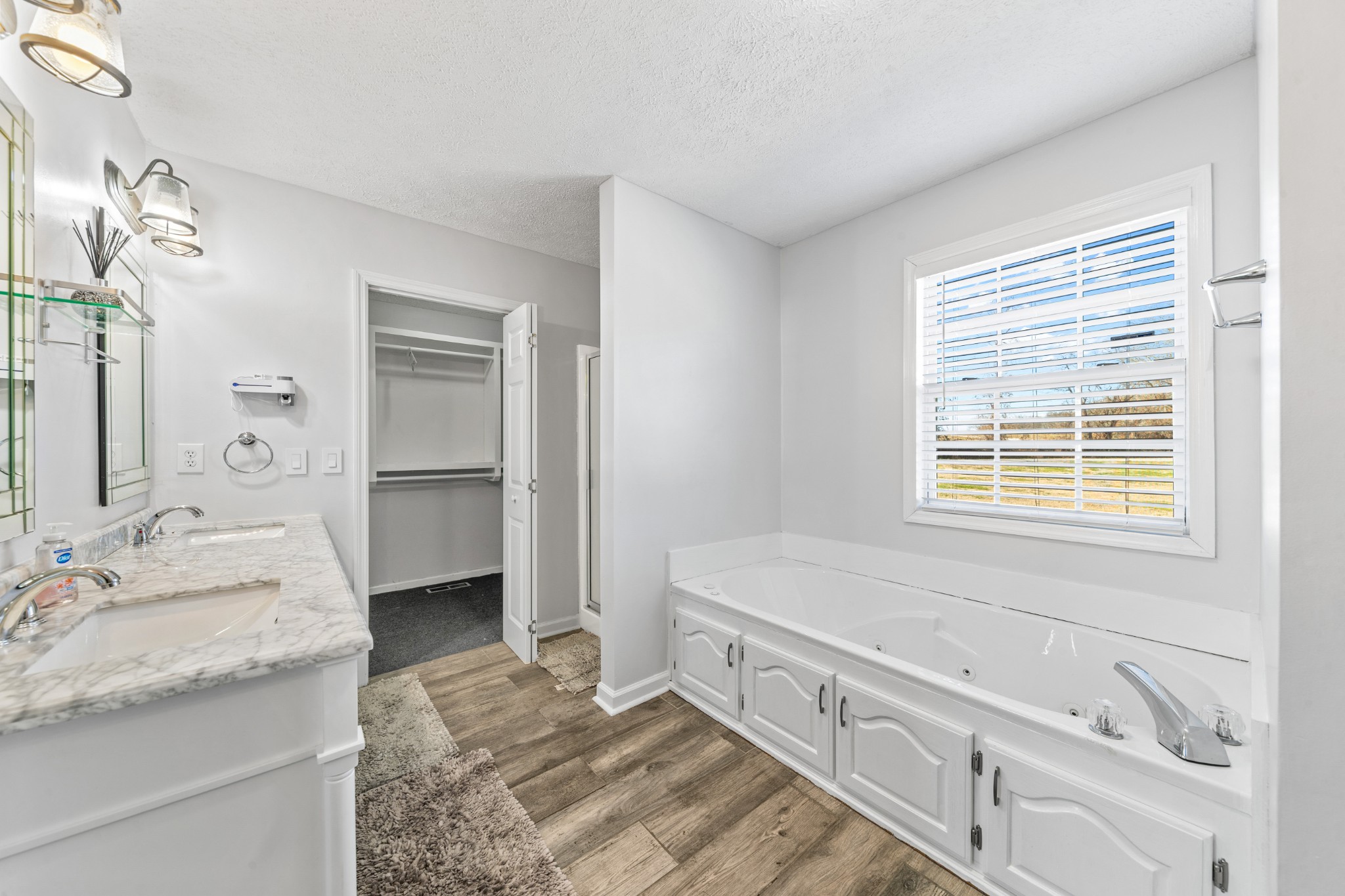 2200 Crescentview Road Pulaski, TN 38478 - Photo 37 of 69 a bathroom with a granite countertop sink and a mirror