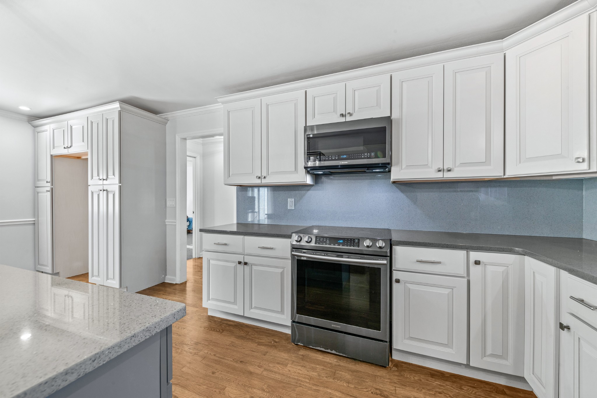 2200 Crescentview Road Pulaski, TN 38478 - Photo 9 of 69 a kitchen with stainless steel appliances granite countertop a stove a sink and a refrigerator