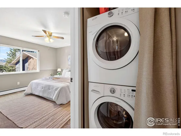 a view of living room with washer and dryer