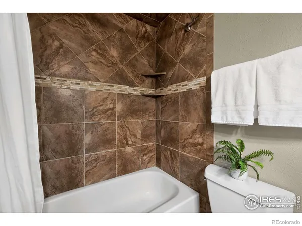 a bathroom with a sink and a shower