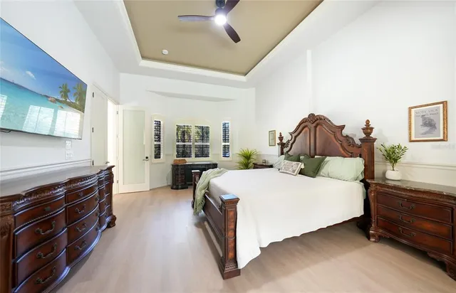 a bedroom with a bed and a dresser