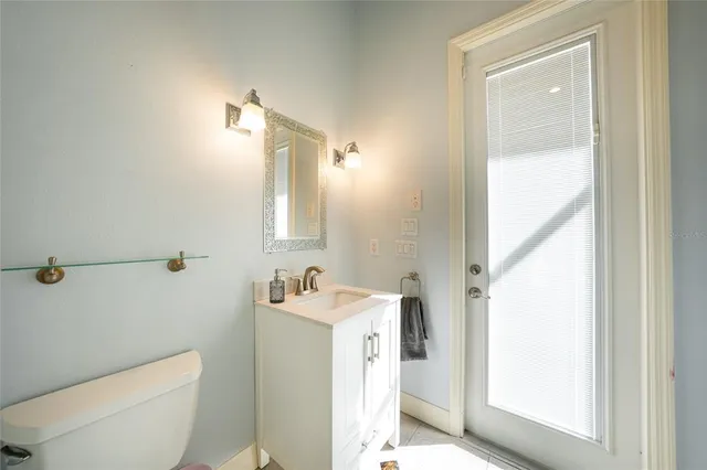 a spacious bedroom with a bed and a table