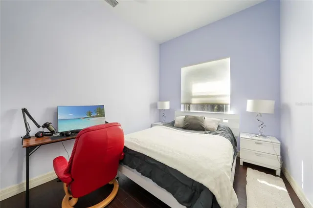 a room with furniture and wooden floor