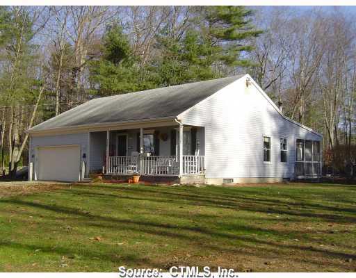 130 Gorman Road Brooklyn, CT 06234 - Photo 1 of 1 a front view of house with yard and green space