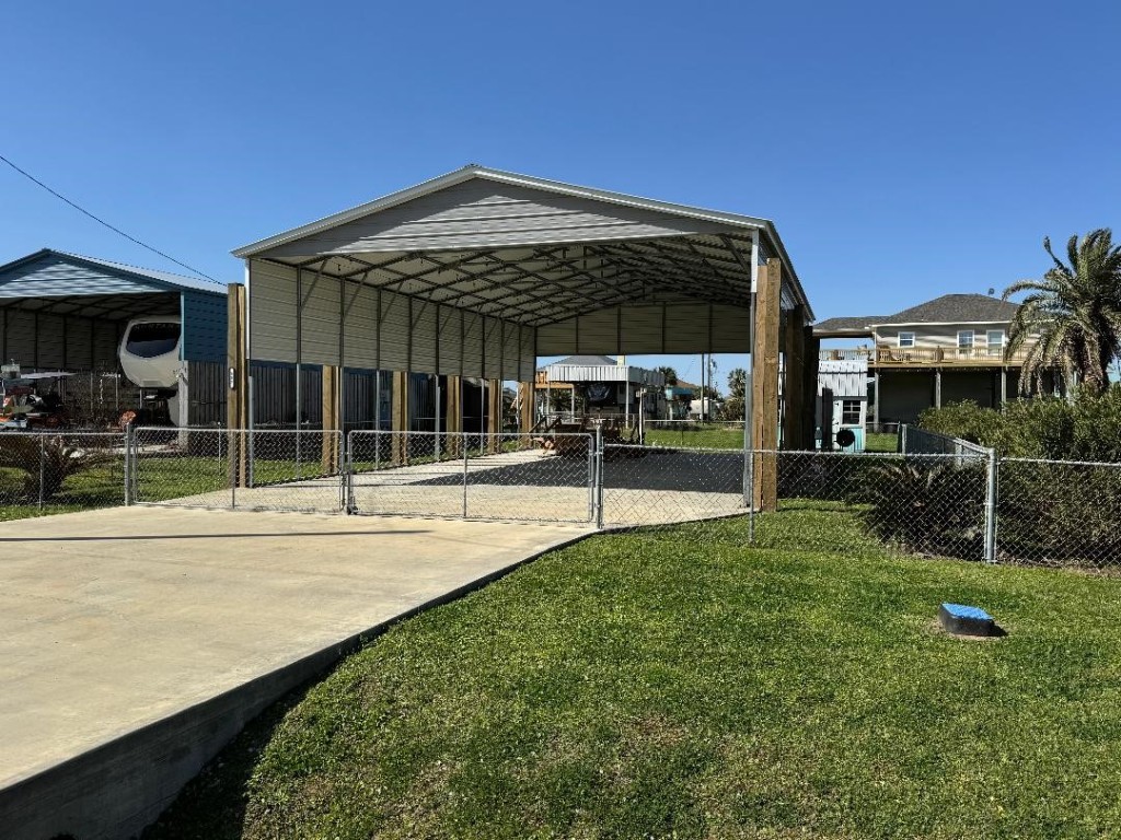 a view of a house with a yard patio and a patio
