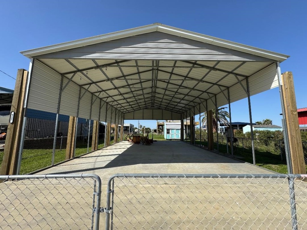 927 South East Road Crystal Beach, TX 77650 - Photo 2 of 6 a view of a porch