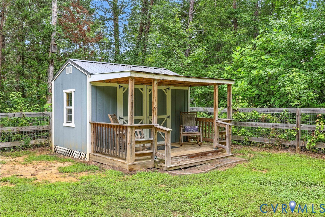 2986 Ballsville Road Powhatan, VA 23139 - Photo 12 of 43 View of outbuilding with a fenced backyard