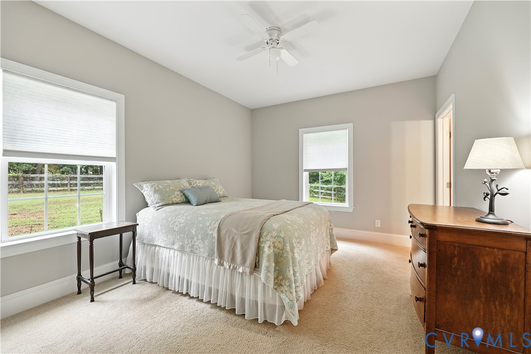 2986 Ballsville Road Powhatan, VA 23139 - Photo 35 of 43 Bedroom with light carpet and a ceiling fan