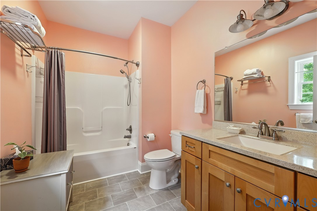 2986 Ballsville Road Powhatan, VA 23139 - Photo 37 of 43 Bathroom featuring vanity and shower / bathtub com