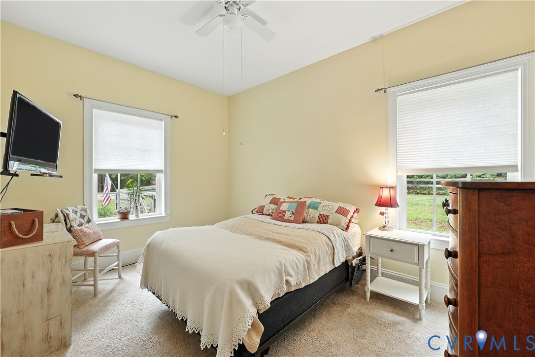 2986 Ballsville Road Powhatan, VA 23139 - Photo 38 of 43 Bedroom with light carpet and a ceiling fan