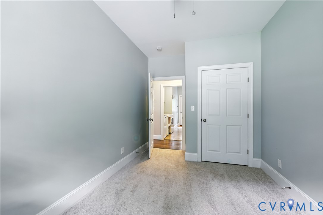 2986 Ballsville Road Powhatan, VA 23139 - Photo 43 of 43 Unfurnished bedroom featuring carpet floors and ba