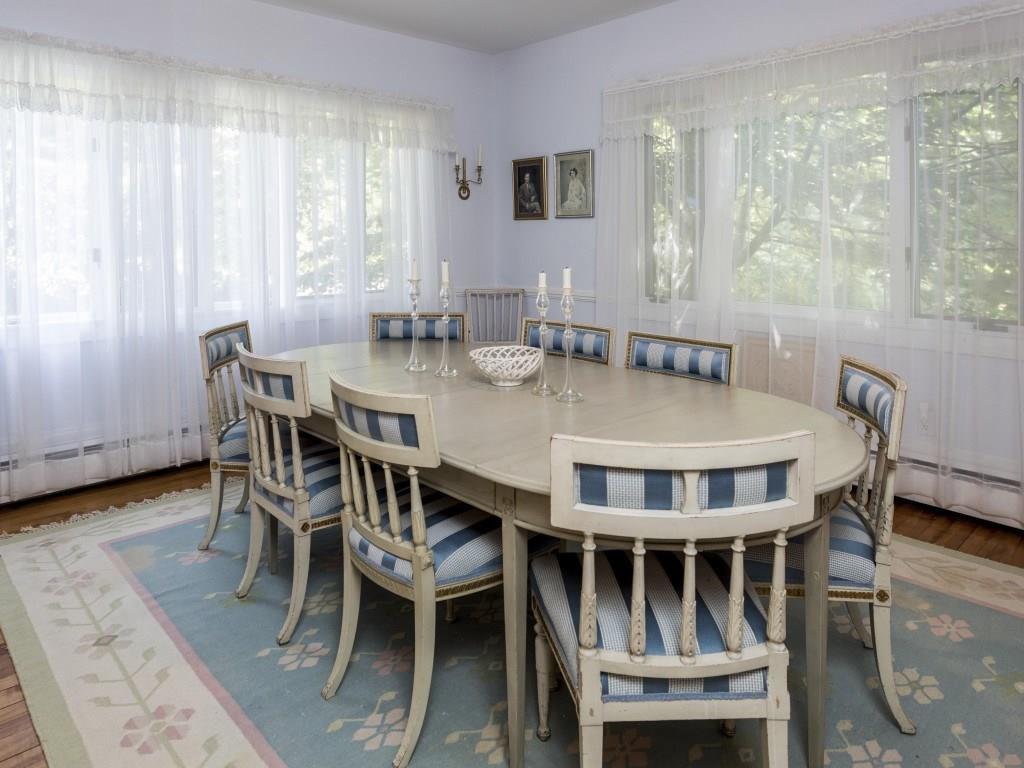 111 Paradise Point Road East Boothbay, ME 04544 - Photo 7 of 35 The formal dining room with hardwood...