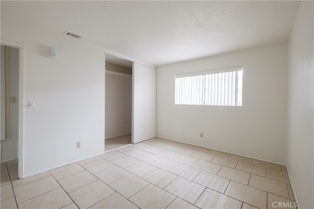 3771 Harvill Lane Riverside, CA 92503 - Photo 15 of 53 an empty room with windows