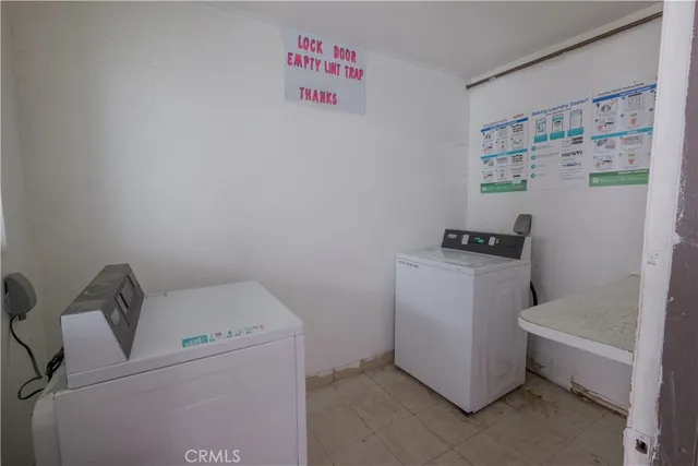 a view of a kitchen with a sink cabinets and window