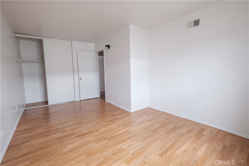 3771 Harvill Lane Riverside, CA 92503 - Photo 35 of 53 a view of empty room with wooden floor