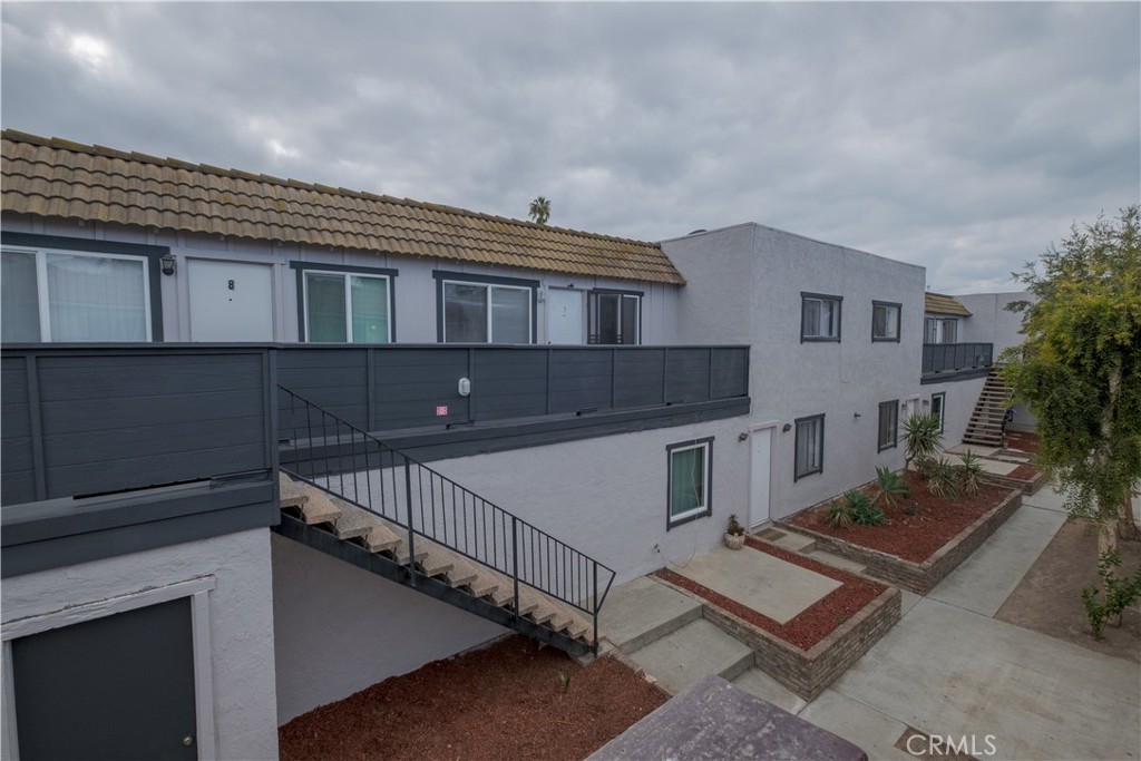 3771 Harvill Lane Riverside, CA 92503 - Photo 5 of 53 a view of house with staircase and wooden floor